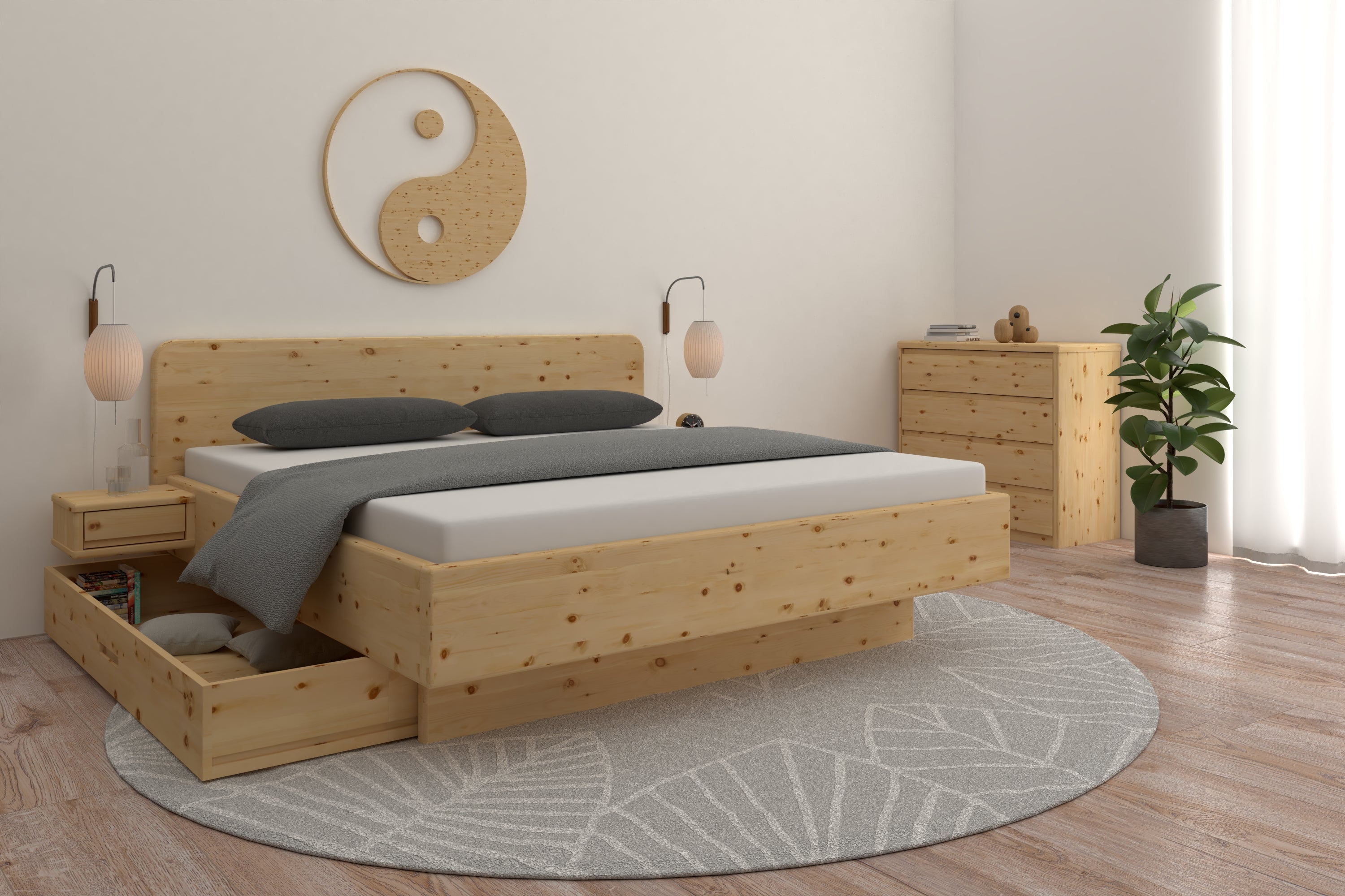 Zirbenbett mit Schubladen zur Aufbewahrung in einem Feng Shui Schlafzimmer