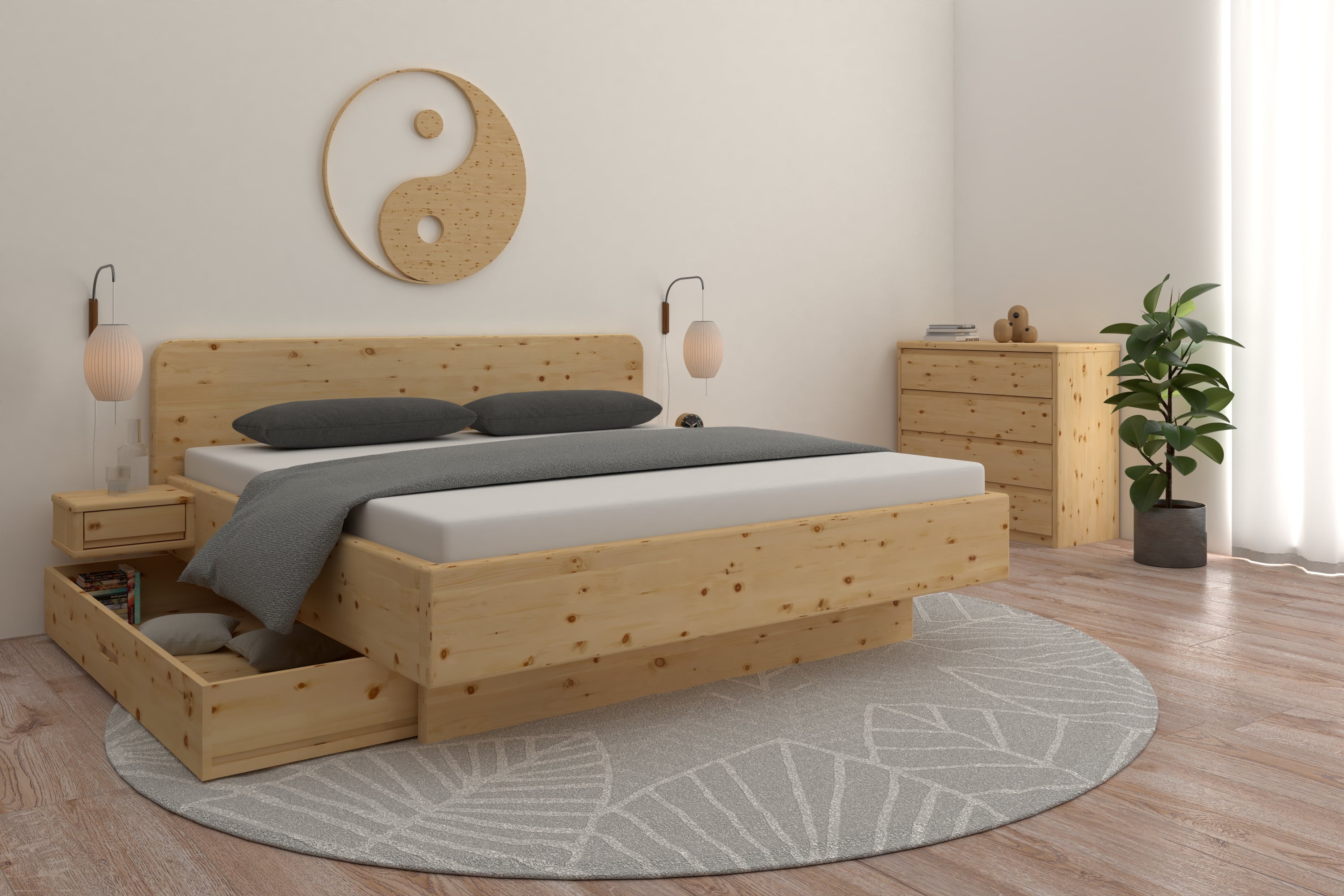 Zirbenbett mit Schubladen zur Aufbewahrung in einem Feng Shui Schlafzimmer 