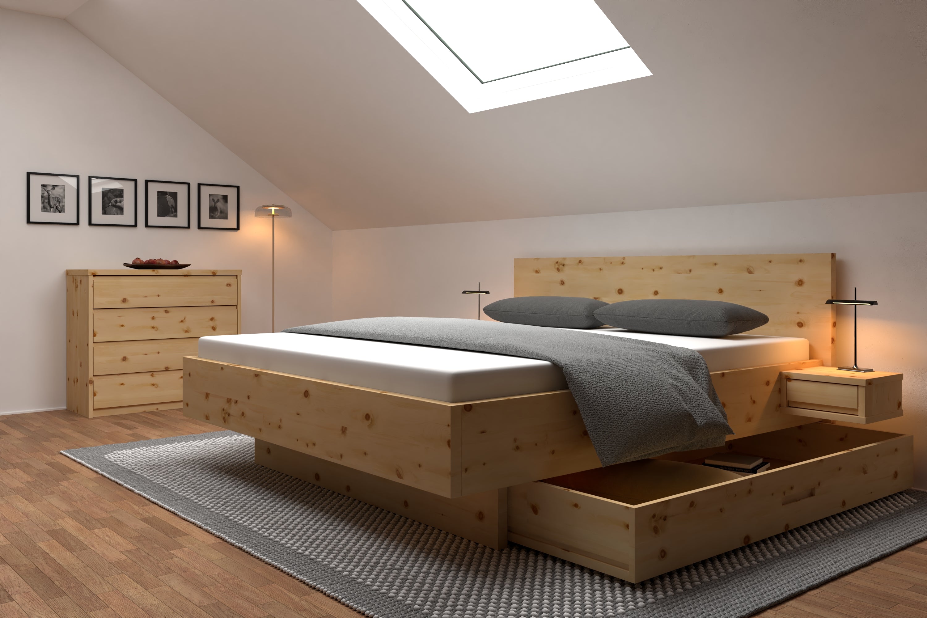 Zirbenbett mit ausziehbaren Schubladen in modernem Schlafzimmer 